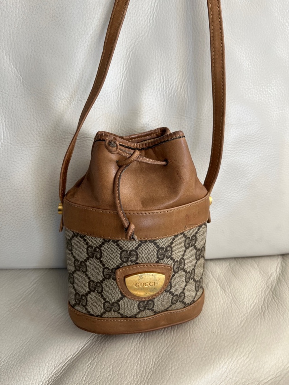 Gucci GG Canvas Mini Drawstring Crossbody Bag